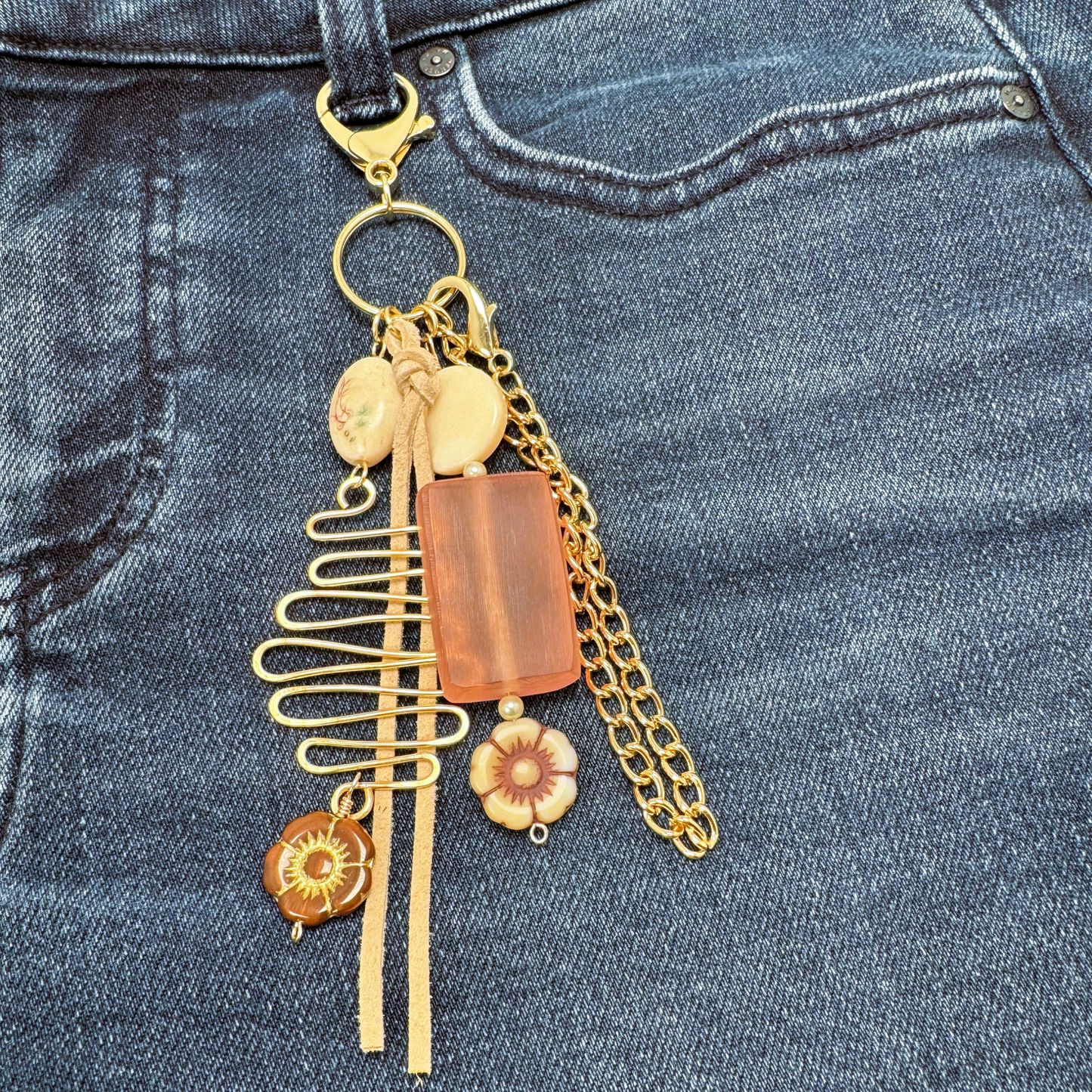 Handmade Bohème Purse Charm with glass bead, ceramic flower charms, vintage bead, and gold-tone chain. Clips onto purses, backpacks, and more.