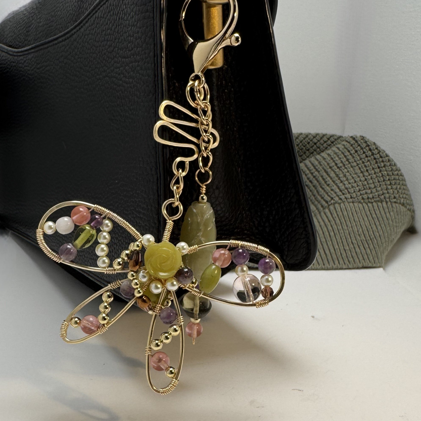 Handmade butterfly purse charm with forged wire, semi-precious and glass stones, symbolizing new beginnings