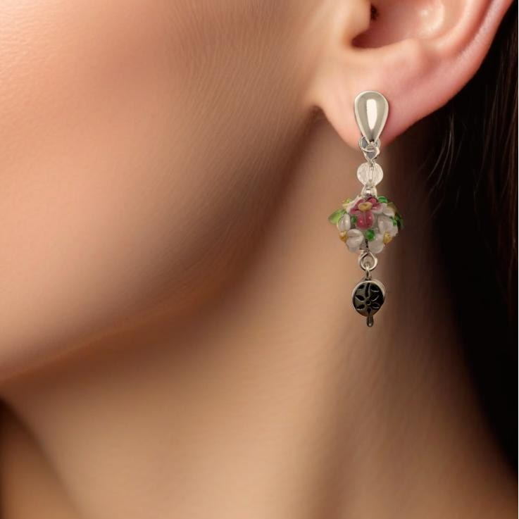 Delicate and feminine Blossom Dangle Earrings featuring intricately designed floral lamp work glass beads that exude charm and elegance