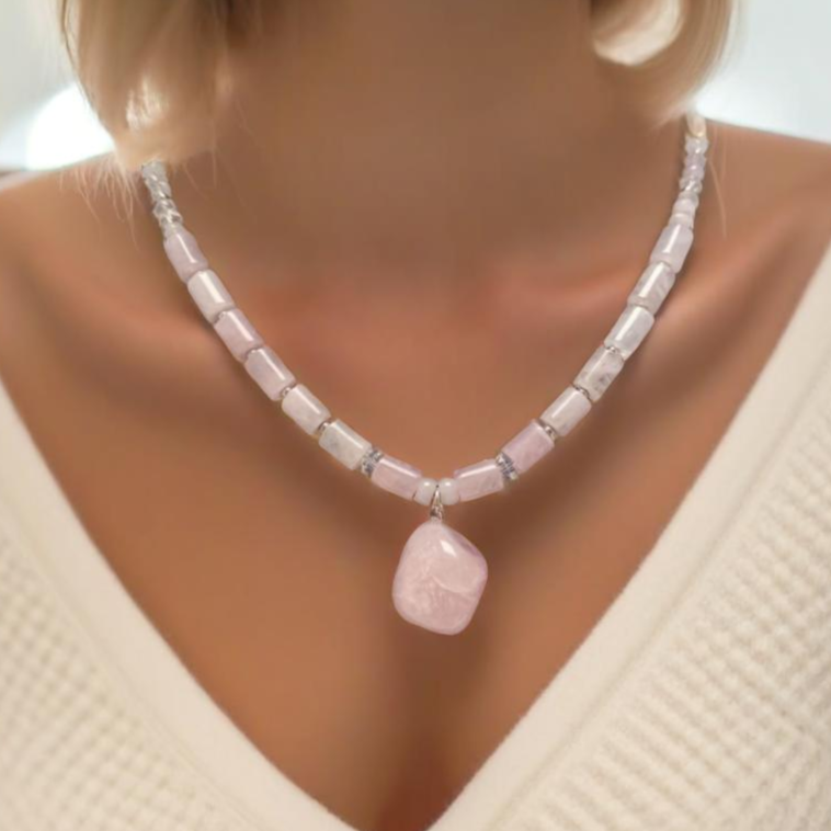 A delicate handmade rose quartz Y-necklace with silver accents, designed for layering or wearing alone. Featuring the "Love Stone," rose quartz is believed to open the heart to love and healing. Handmade in Canada.